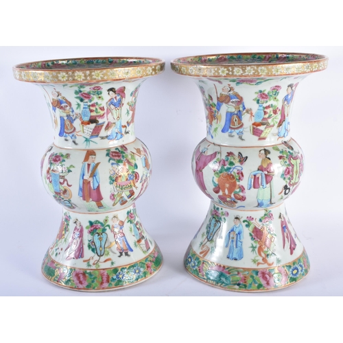 217 - A RARE PAIR OF 19TH CENTURY CHINESE CANTON FAMILLE ROSE GU FORM VASES Qing, painted with figures and... 