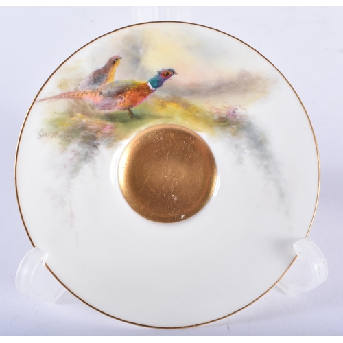 231 - A ROYAL WORCESTER STINTON PORCELAIN GAME BIRD CUP AND SAUCER. 9.5 cm diameter.