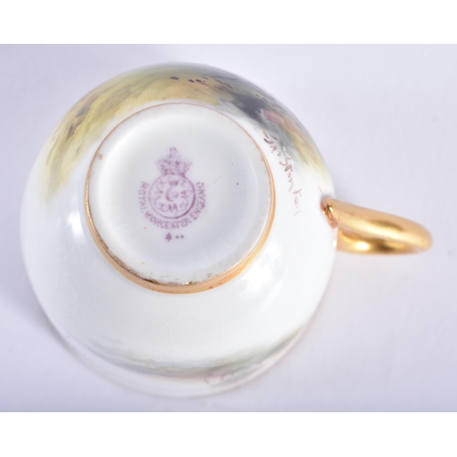 232 - A ROYAL WORCESTER STINTON PORCELAIN GAME BIRD CUP AND SAUCER. 9.5 cm diameter.