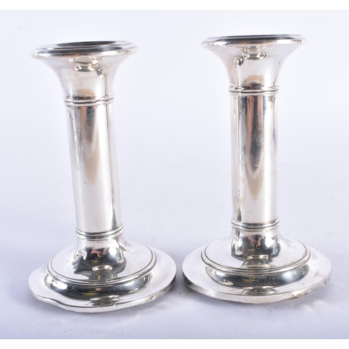 257 - A PAIR OF EDWARDIAN SILVER DWARF CANDLESTICKS. Birmingham 1904. 12.5 cm high.