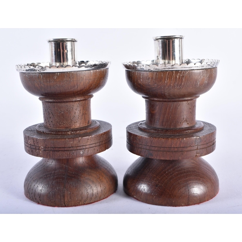 261 - A PAIR OF VICTORIAN SILVER MOUNTED WOOD CANDLESTICKS. London 1860. 551 grams overall. 10.5 cm x 8 cm... 