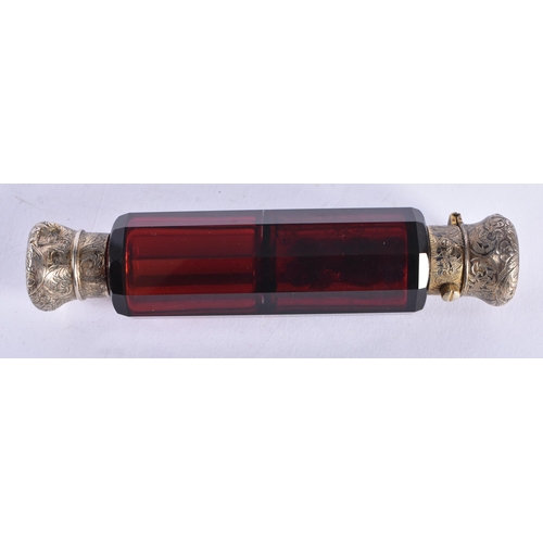 270 - A VICTORIAN SILVER MOUNTED RUBY GLASS SCENT BOTTLE. 153 grams overall. 13 cm long.