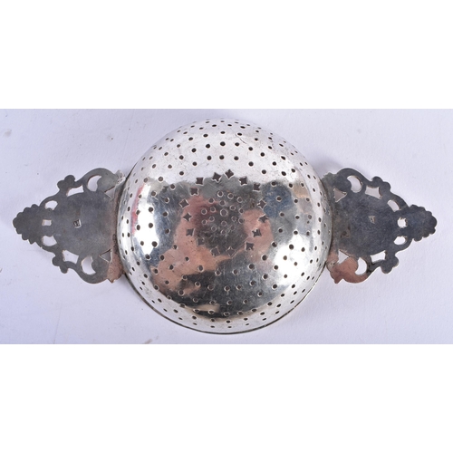 271 - A VERY RARE GEORGE I SILVER TEA STRAINER. 79 grams. 17.25 cm x 9 cm.