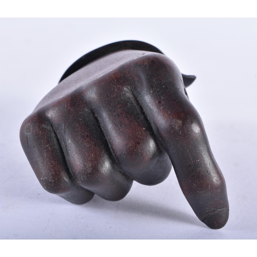 289 - AN EARLY 19TH CENTURY ENGLISH TREEN CARVED WOOD CLENCHED HAND. 9 cm x 5 cm.