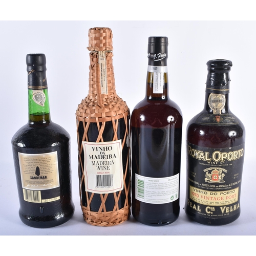 342 - TWO MADEIRA WINE BOTTLES and two bottles of port. (4)