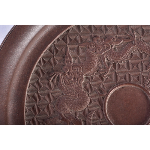 359 - A 17TH/18TH CENTURY CHINESE YIXING POTTERY PLATE Kangxi/Yongzheng. 12 cm diameter.