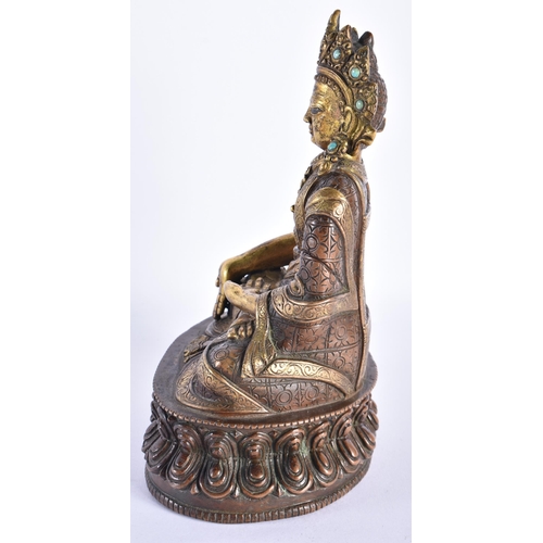 361 - AN 18TH CENTURY TIBETAN PARTIAL GILT BRONZE FIGURE OF A BUDDHA modelled upon a lotus capped base. 19... 