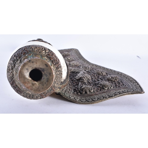 367 - A LARGE 19TH CENTURY TIBETAN REPOUSSE DRAGON HORN decorated in relief with foliage. 34 cm wide.