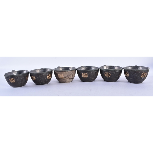 375 - AN ANTIQUE CHINESE PEWTER AND COCONUT TEASET Qing. (qty)