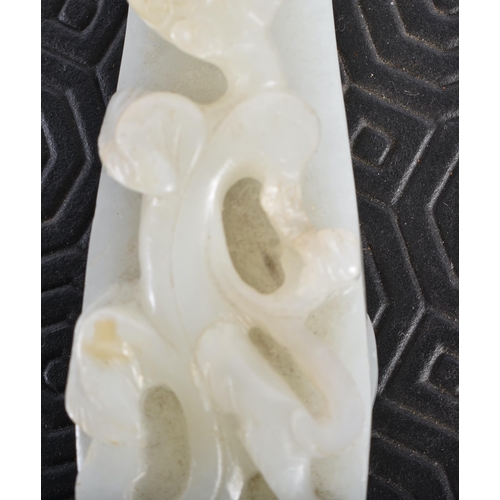 383 - AN 18TH CENTURY GREENISH WHITE JADE BELT HOOK Qing. 12.5 cm long.