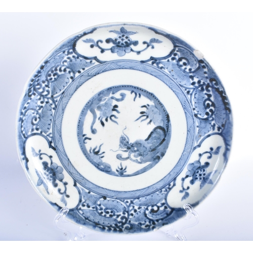 389 - AN 18TH CENTURY JAPANESE EDO PERIOD BLUE AND WHITE PORCELAIN DRAGON PLATE together with two Satsuma ... 