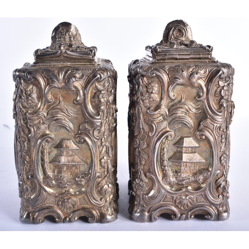 390 - A FINE PAIR OF GEORGE III SILVER CHINOISERIE TEA CADDIES by Thomas Pitts I, After Paul De Lamerie, d... 