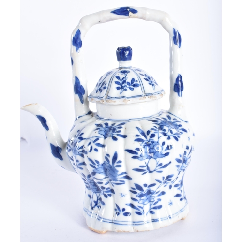 391 - A 17TH CENTURY CHINESE BLUE AND WHITE LOBED TEAPOT AND COVER Kangxi, with high loop handle, painted ... 