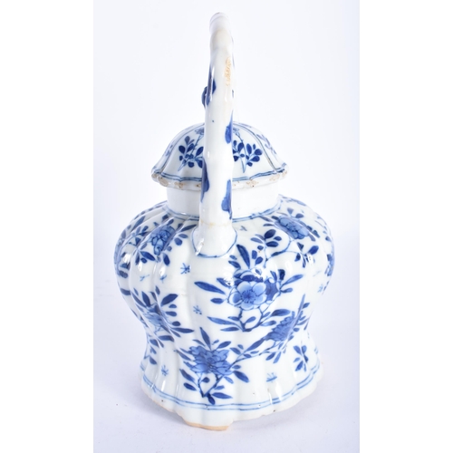 391 - A 17TH CENTURY CHINESE BLUE AND WHITE LOBED TEAPOT AND COVER Kangxi, with high loop handle, painted ... 