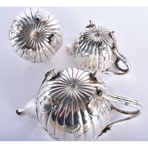 393 - A FINE 19TH CENTURY JAPANESE MEIJI PERIOD THREE PIECE SILVER TEASET of beautiful quality, decorated ... 