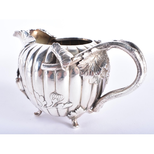 393 - A FINE 19TH CENTURY JAPANESE MEIJI PERIOD THREE PIECE SILVER TEASET of beautiful quality, decorated ... 