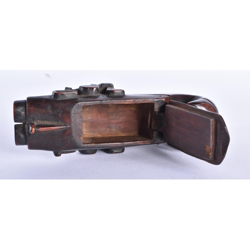 395 - AN UNUSUAL 18TH CENTURY CARVED TREEN WOOD PERCUSSION PISTOL SNUFF BOX. 13.5 cm wide. Note: Snuff box... 