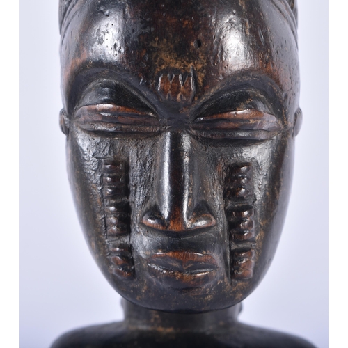 401 - AN AFRICAN BAULE TRIBAL CARVED WOOD MALE FIGURE Ivory Coast. 33 cm high.