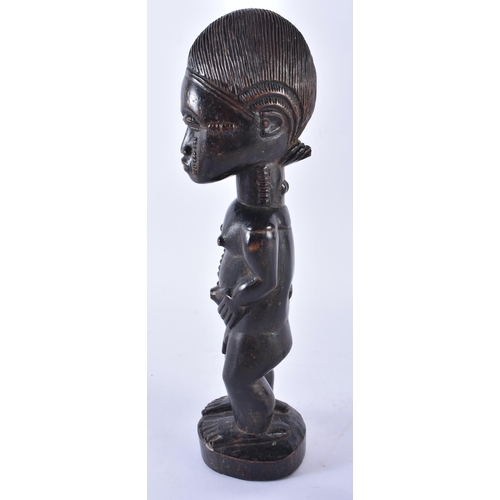 401 - AN AFRICAN BAULE TRIBAL CARVED WOOD MALE FIGURE Ivory Coast. 33 cm high.