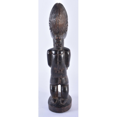 401 - AN AFRICAN BAULE TRIBAL CARVED WOOD MALE FIGURE Ivory Coast. 33 cm high.