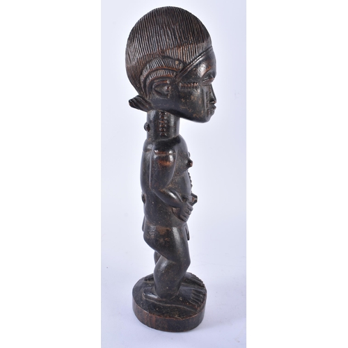 401 - AN AFRICAN BAULE TRIBAL CARVED WOOD MALE FIGURE Ivory Coast. 33 cm high.