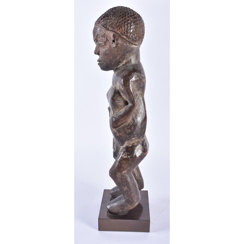 402 - AN AFRICAN TRIBAL CARVED WOOD FEMALE FIGURE Congo. 37 cm high.