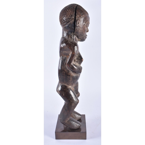 402 - AN AFRICAN TRIBAL CARVED WOOD FEMALE FIGURE Congo. 37 cm high.