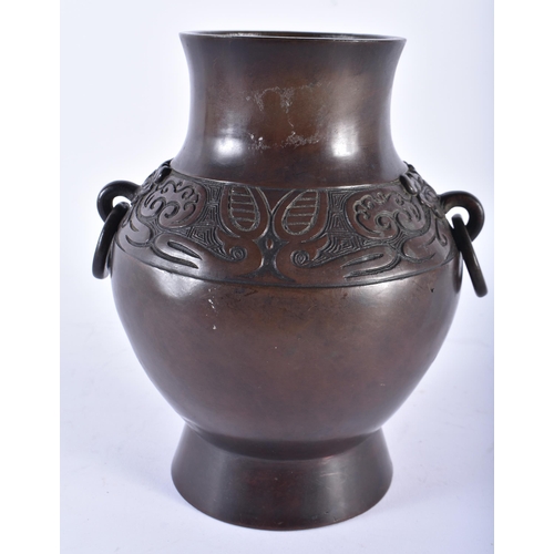 404 - A 19TH CENTURY CHINESE TWIN HANDLED BRONZE VASE Late Qing. 21 cm x 15 cm.