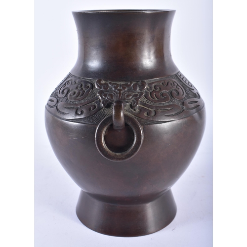 404 - A 19TH CENTURY CHINESE TWIN HANDLED BRONZE VASE Late Qing. 21 cm x 15 cm.