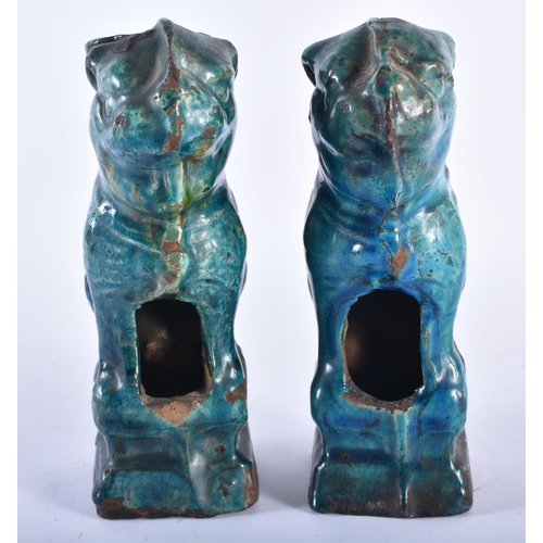 405 - A PAIR OF 17TH/18TH CENTURY CHINESE TURQUOISE GLAZED BEASTS Ming/Qing. 17 cm high.