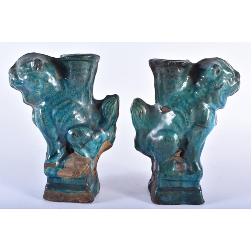 405 - A PAIR OF 17TH/18TH CENTURY CHINESE TURQUOISE GLAZED BEASTS Ming/Qing. 17 cm high.