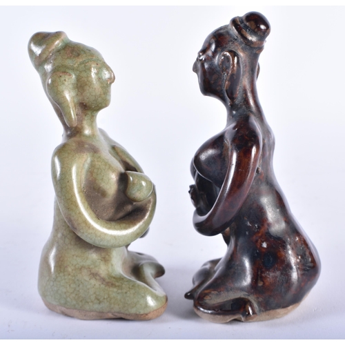 406 - A PAIR OF EARLY SOUTHEAST ASIAN CAMBODIAN POTTERY FERTILITY FIGURES. 14 cm high.