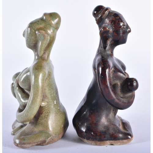 406 - A PAIR OF EARLY SOUTHEAST ASIAN CAMBODIAN POTTERY FERTILITY FIGURES. 14 cm high.