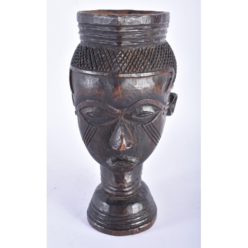 407 - AN AFRICAN TRIBAL KUBA DRINKING CUP Congo. 20 cm high.