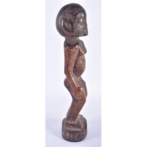 409 - AN AFRICAN TRIBAL WEST AFRICAN CARVED WOOD FON FIGURE Benin. 37 cm high.