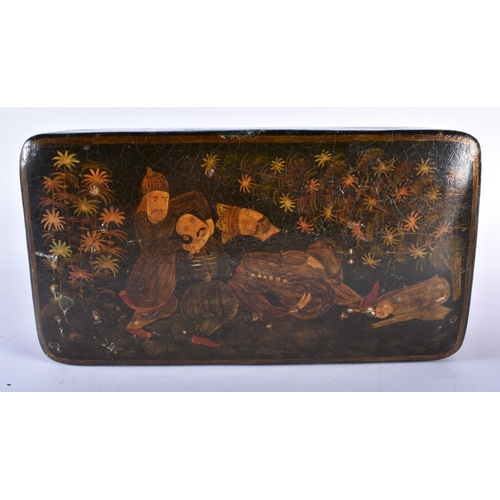 410 - A 19TH CENTURY PERSIAN QAJAR LACQUERED BOX AND COVER decorated with figures in landscapes. 23 cm x 1... 