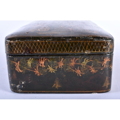 410 - A 19TH CENTURY PERSIAN QAJAR LACQUERED BOX AND COVER decorated with figures in landscapes. 23 cm x 1... 