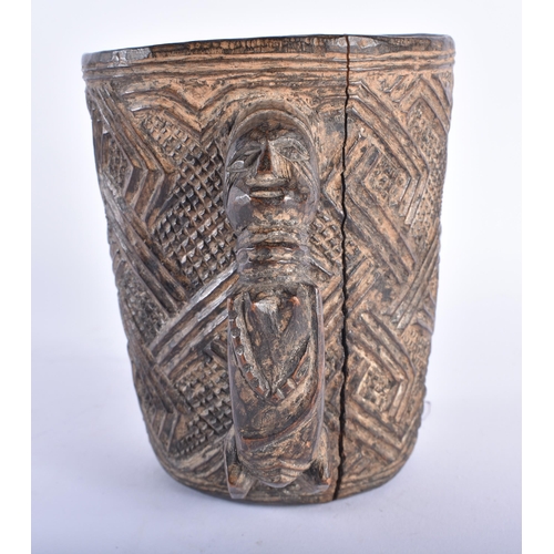 417 - AN AFRICAN TRIBAL CARVED WOOD KUBA DRINKING CUP Ivory Coast. 14.5 cm high.