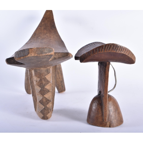 420 - A LARGE AFRICAN TRIBAL LOBE STOOL together with a similar headrest. Largest 48 cm x 28 cm. (2)