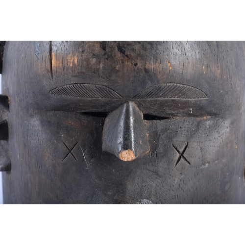 422 - A LARGE AFRICAN TRIBAL MENDE MASK Sierra Leone. 41 cm x 22 cm.