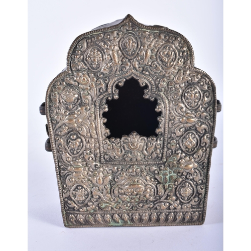 433 - AN ANTIQUE TIBETAN MIXED METAL REPOUSSE GAU SHRINE. 13 cm x 9 cm.