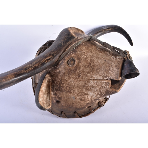 443 - A VERY LARGE WEST AFRICAN TRIBAL CARVED WOOD BUFFALO MASK. 62 cm long.