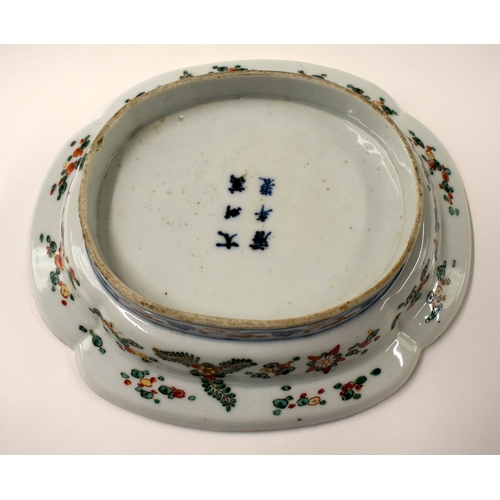 446 - A 19TH CENTURY CHINESE WUCAI PORCELAIN FOOTED DISH bearing Wanli marks to base. 24 cm x 22 cm.