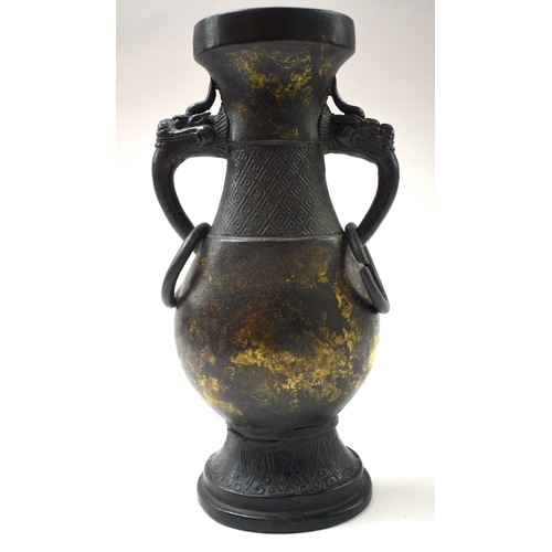 451 - A CHINESE QING DYNASTY GOLD SPLASH BRONZE VASE. 24 cm high.