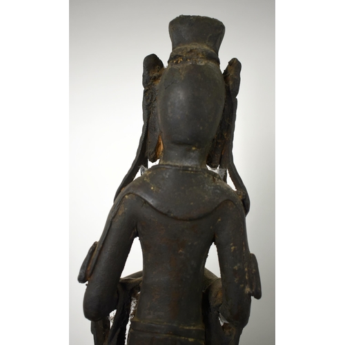 452 - AN UNUSUAL 18TH/19TH CENTURY CHINESE KOREAN BRONZE BUDDHA modelled with hands clasped. 38 cm high.