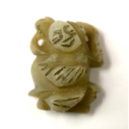 457 - A 19TH CENTURY CHINESE CARVED JADE BELT HOOK Qing, together with other jade. (4)