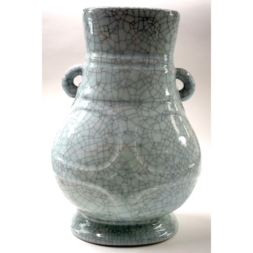 467 - A LARGE CHINESE GUAN TYPE TWIN HANDLED VASE probably late Qing Dynasty. 36 cm x 20 cm.