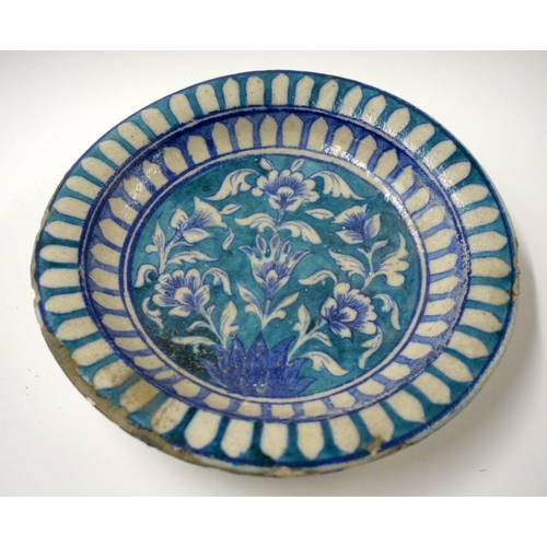 473 - AN EARLY HISPANO MORESQUE POTTERY LUSTRE BOWL together with a Persian dish. Largest 21.5 cm wide. (2... 