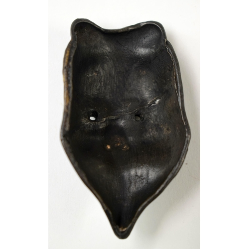 486 - FOUR 19TH CENTURY JAPANESE MEIJI PERIOD BRONZE MASK NETSUKES. Largest 7 cm x 5 cm. (4)