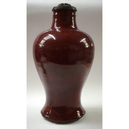 493 - A CHINESE QING DYNASTY FLAMBE SANG DU BOEUF VASE. 35 cm high.